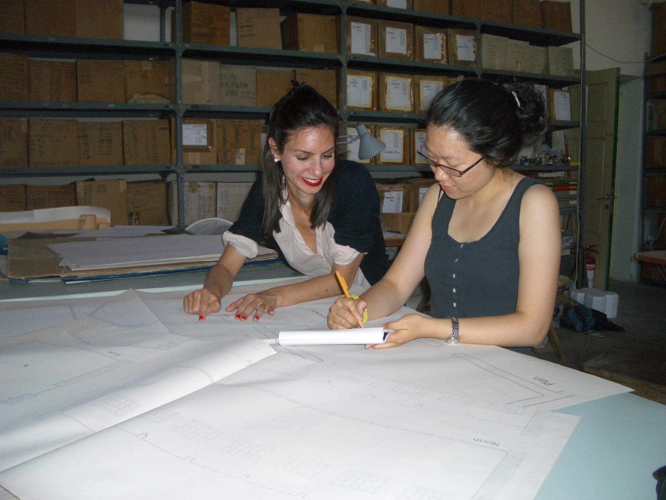 Gloria and I inspect architectural drawings