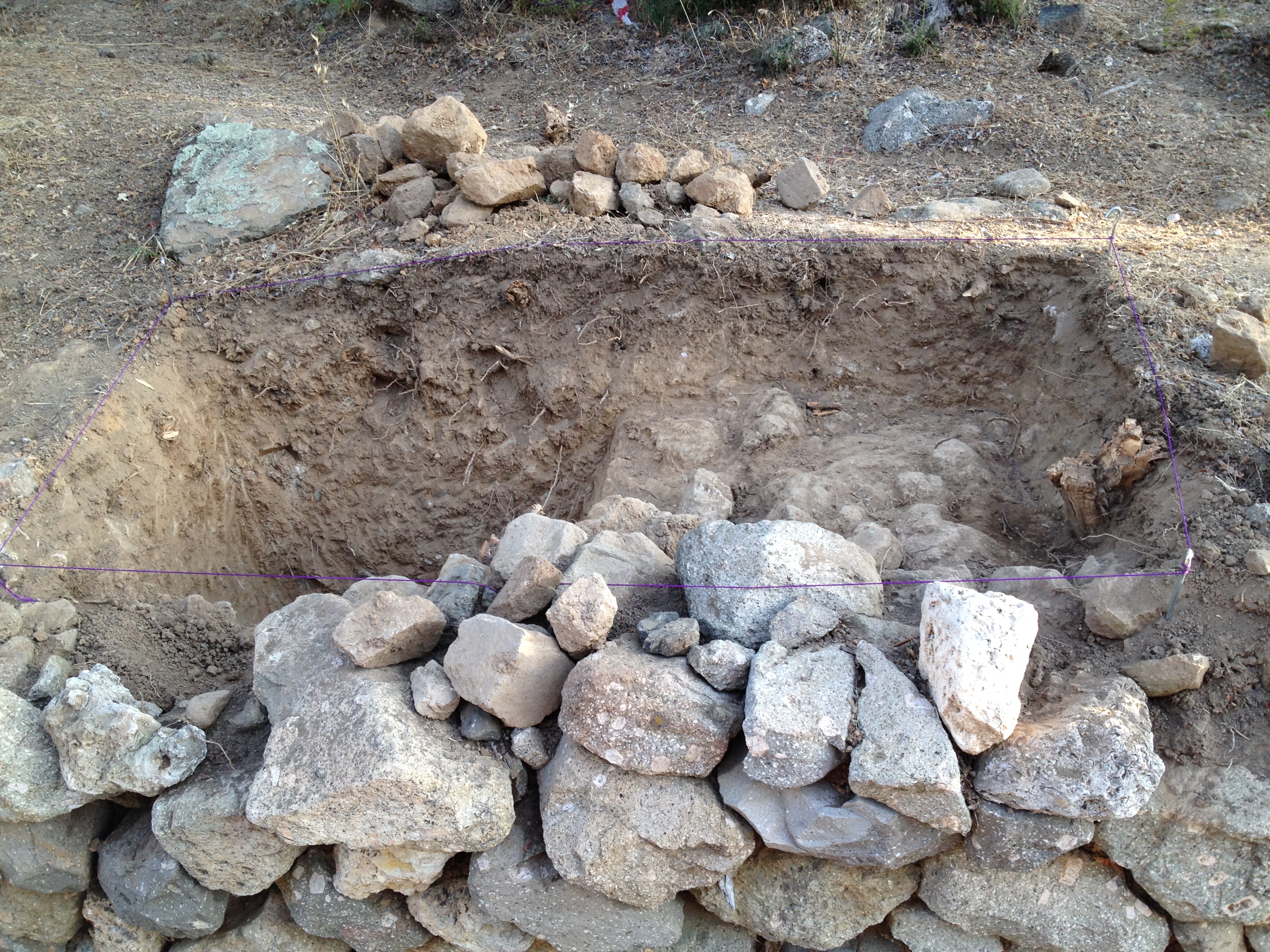 Our trench behind the ancient retaining wall of the Sacred Way.
